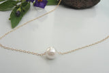 Simple pearl necklaces